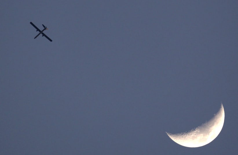An Israeli drone is seen flying over Gaza as seen from the northern Gaza Strip border, April 9, 2011. (photo credit: REUTERS)