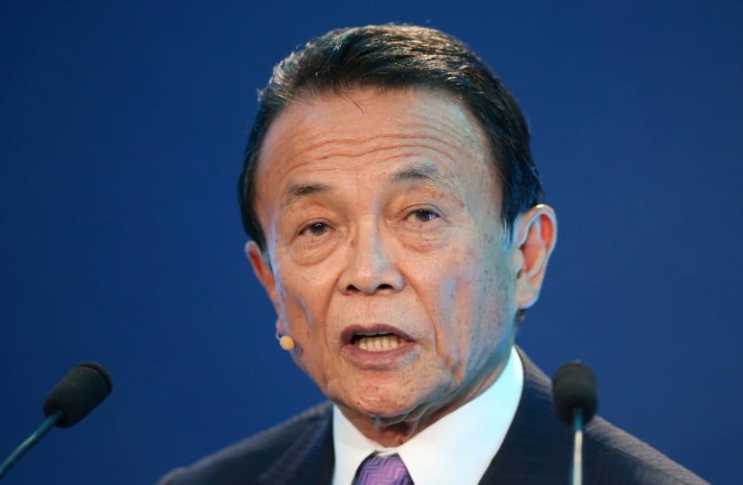 Taro Aso, Deputy Prime Minister, Minister of Finance and Minister of State for Financial Services of Japan, speaks during the Milken Institute Global Conference in Beverly Hills, California (photo credit: LUCY NICHOLSON / REUTERS)
