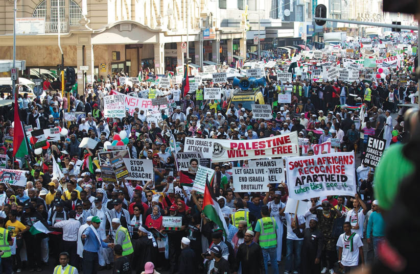 PRO-PALESTINIAN DEMONSTRATORS protest against Israel’s military action in Gaza, after Friday prayers in Durban in 2014 (photo credit: REUTERS)