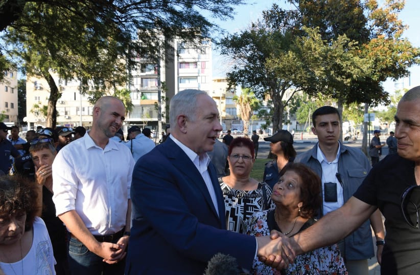 Prime Minister Benjamin Netanyahu tours south Tel Aviv (photo credit: AMOS BEN-GERSHOM/GPO)