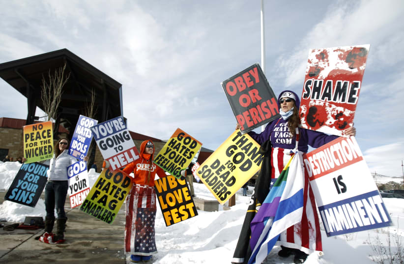 Members from the Westboro Baptist Church.  (photo credit: MARIO ANZUONI/REUTERS)