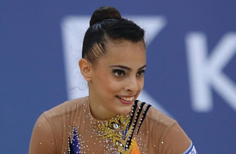 Israeli gymnast Linoy Ashram won an historic bronze medal in the all-around final at the World Rhythmic Gymnastics Championships final, September 1, 2017. (photo credit: OLYMPIC COMMITTEE OF ISRAEL)