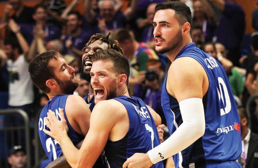 Israel’s players know they have little time to celebrate the comeback win over Germany, with another must-win EuroBasket game coming up against Georgia at Yad Eliyahu Arena in Tel Aviv. (photo credit: ADI AVISHAI)