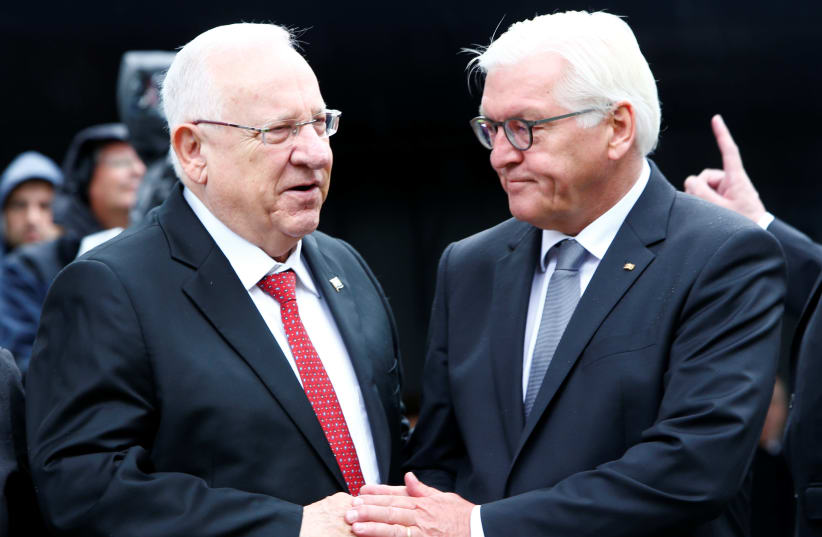 Germany's President Frank-Walter Steinmeier greets Israel's President Reuven Rivlin as they attend the opening of "The Munich 1972 Massacre Memorial" dedicated to the 1972 Olympic attack in Munich, Germany September 6, 2017. (photo credit: REUTERS)