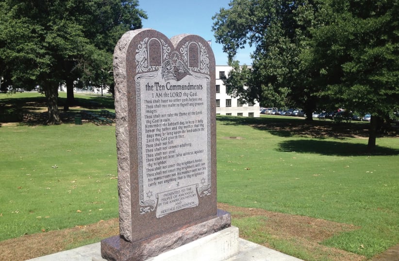 STATUE of the Ten Commandments is seen after it was installed on the grounds of the state Capitol in Little Rock, Arkansas in June. (photo credit: REUTERS)