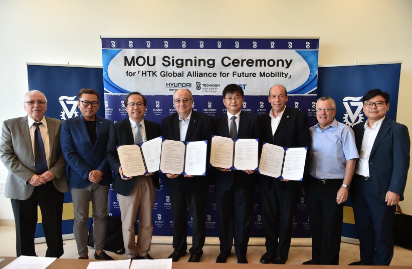 TECHNION PROFESSORS, including Prof. Daniel Weihs (left), sign a memorandum of understanding with partners from South Korea’s KAIST University and Hyundai Motor Company in Haifa yesterday. (photo credit: Courtesy)