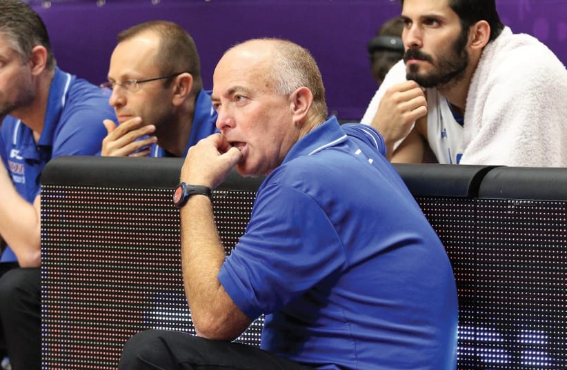 Coach Erez Edelstein (center) and captain Omri Casspi (right) will not be involved in Israel’s World Cup 2019 qualifying campaign which gets under way in November, with the former to be told he will not continue after the dejecting EuroBasket campaign and the latter set to be busy playing with the G (photo credit: ADI AVISHAI)