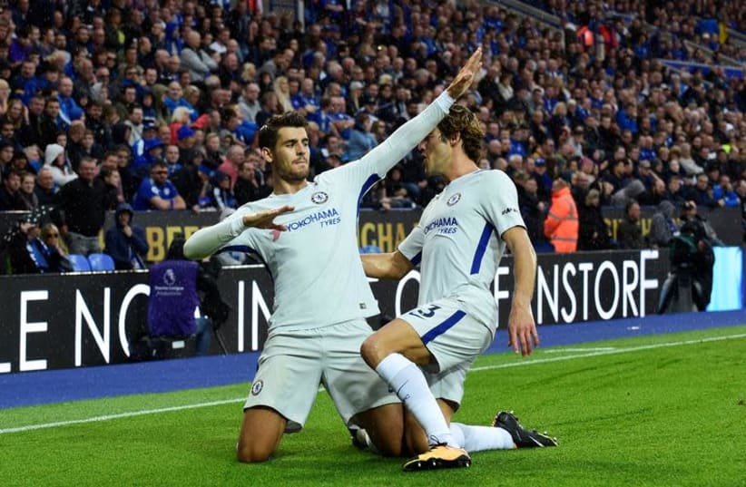 Soccer Football - Premier League - Leicester City vs Chelsea - Leicester, Britain - September 9, 2017 Chelsea's Alvaro Morata celebrates scoring their first goal with Marcos Alonso. (photo credit: REUTERS/REBECCA NADEN)