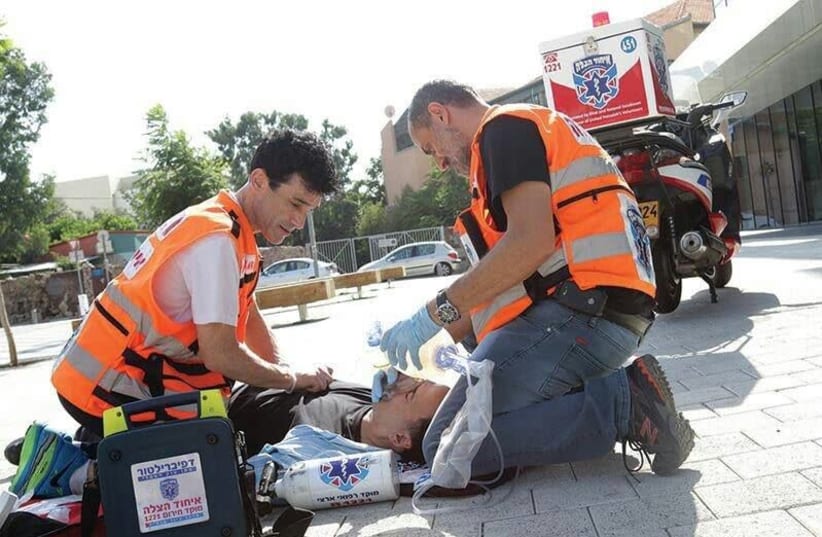 United Hatzalah paramedics practice CPR on a volunteer. (photo credit: COURTESY UNITED HATZALAH)