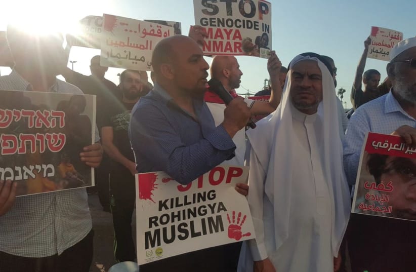 MK MASOUD GNAIM (center) participates in a protest against the killing of his Rohingya Muslim ‘brothers’ in Myanmar, outside the country’s embassy in Tel Aviv, September 11, 2017. (photo credit: UNITED ARAB LIST)
