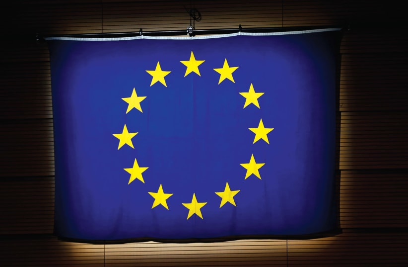 A European Union (EU) flag is pictured during a ceremony in Lausanne. (photo credit: REUTERS)