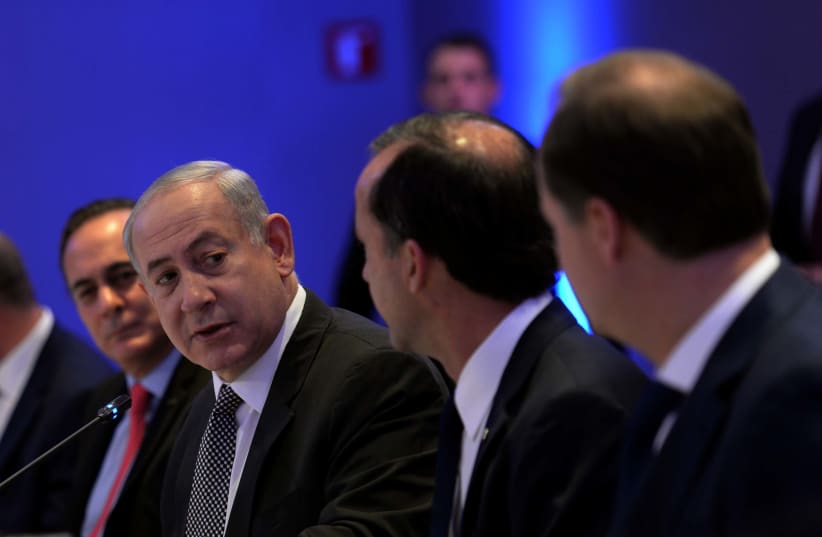 Prime Minister Netanyahu is speaking with the top businessmen of Mexico. (photo credit: AVI OHAYON - GPO)