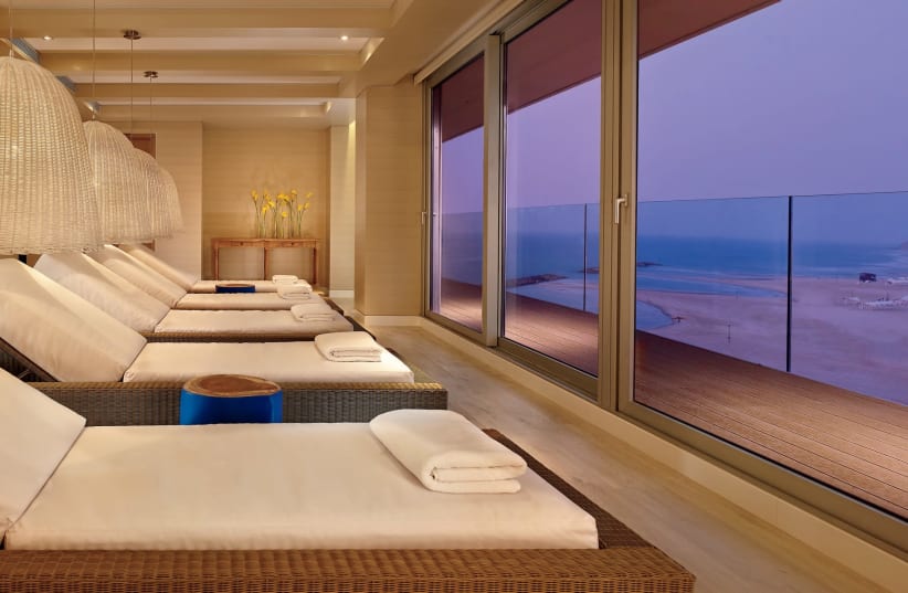 The relaxation room at the spa at the Ritz-Carlton in Herzliya looks out over the sea. (photo credit: MATHEW SHAW)
