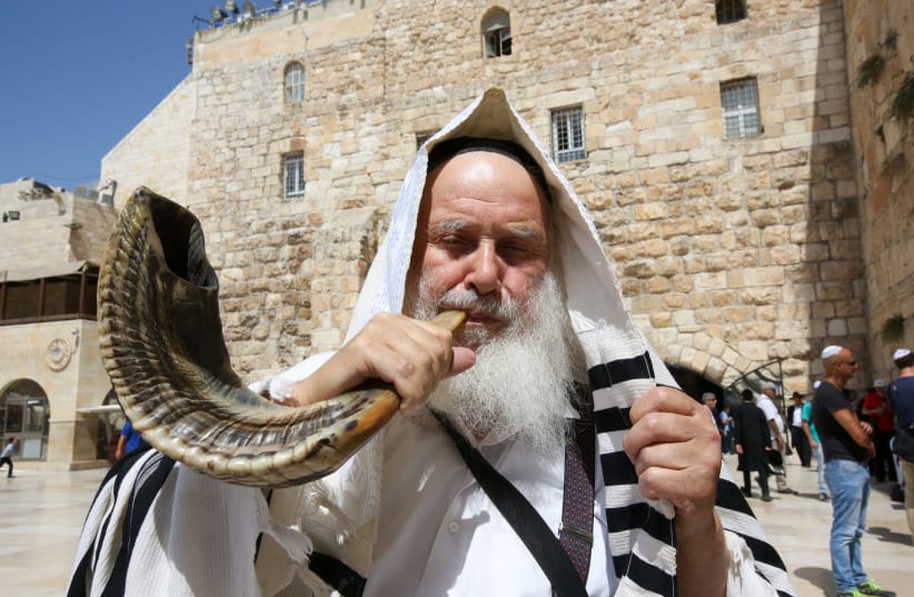 Blowing the shofar at the Western Wall before Rosh Hashana (photo credit: MARC ISRAEL SELLEM)