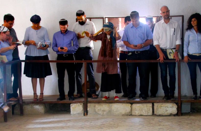 MKs pray at the Shalom Al Yisrael synagogue in Jericho.  (photo credit: TOVAH LAZAROFF)