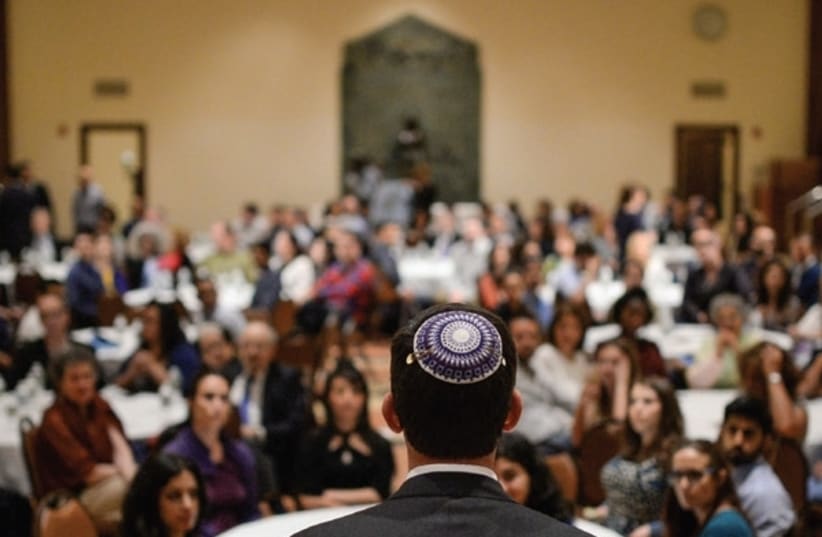 A RABBI speaks to his congregation. (photo credit: REUTERS)