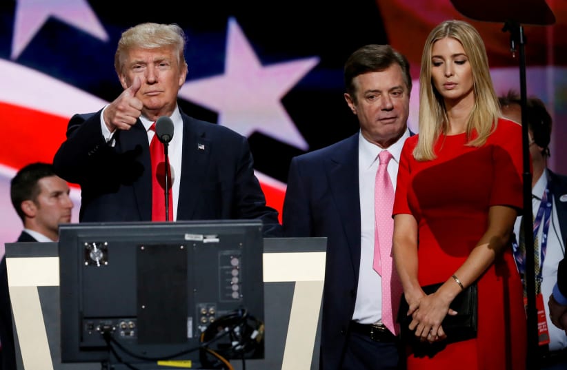 Then-Republican presidential nominee Donald Trump gives a thumbs up as his campaign manager Paul Manafort (C) and daughter Ivanka (R) look on during Trump's walk through at the Republican National Convention in Cleveland, US, July 21, 2016 (photo credit: RICK WILKING / REUTERS)