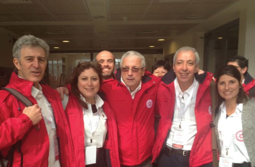 Dr. Michel Alimi (second from the right) with a team of other French medical professionals. (photo credit: Courtesy)