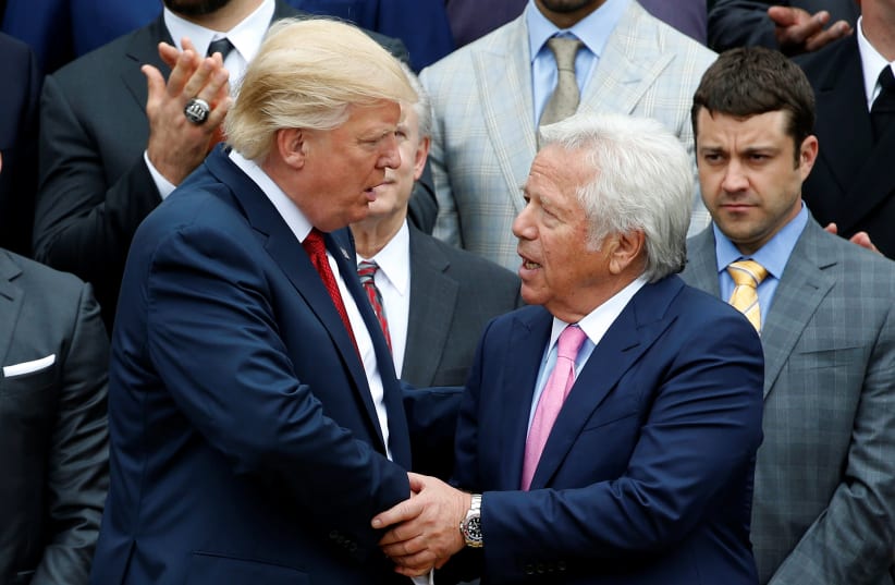 Donald Trump with Patriots owner Robert Kraft. (photo credit: JOSHUA ROBERTS / REUTERS)