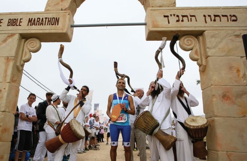 MUSICIANS DRESSED in biblical attire accompany runners during a previous Bible Marathon, which takes place next month in the Binyamin region in the West Bank. (photo credit: BIBLE MARATHON)