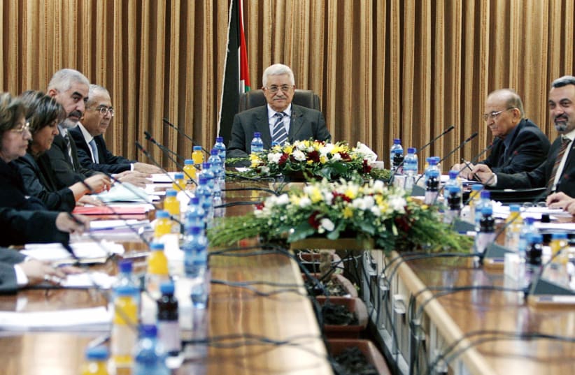 Palestinian Authority President Mahmoud Abbas attends a cabinet meeting in the West Bank city of Ramallah July 4, 2007. (photo credit: REUTERS)