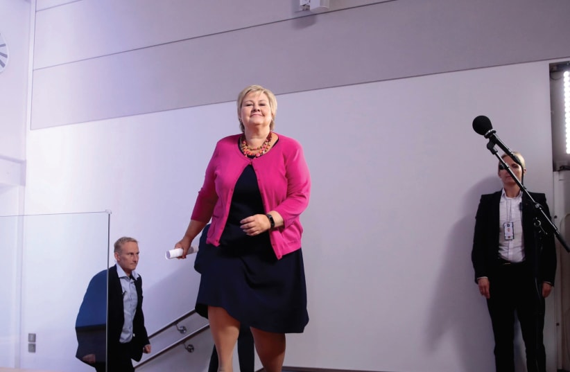 NORWAY’S PRIME MINISTER Erna Solberg arrives at a news conference in Oslo earlier this month. (photo credit: REUTERS)
