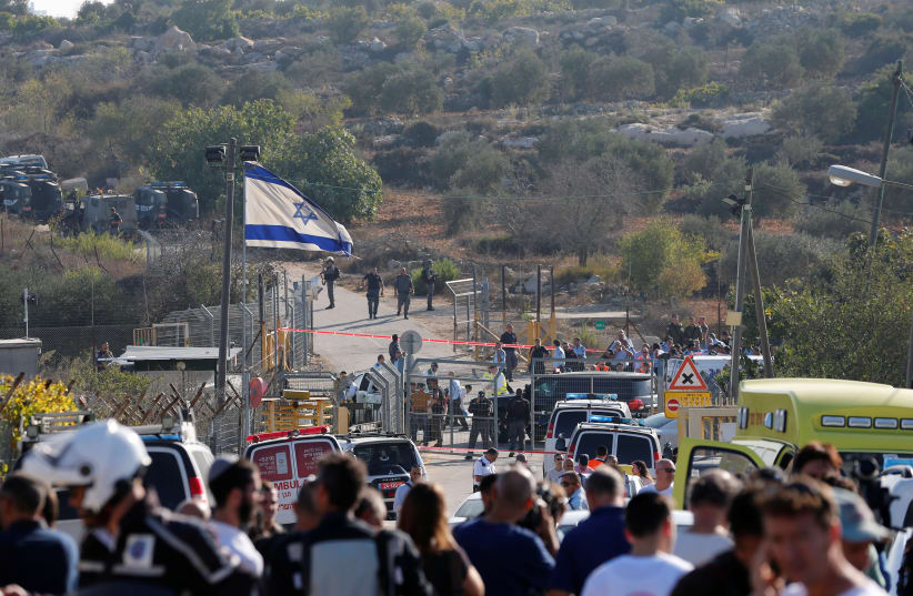 A general view of the scene of the terror attack in Har Adar (photo credit: AMMAR AWAD / REUTERS)