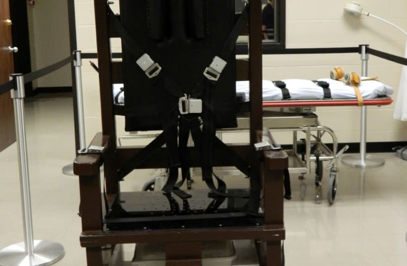  Handout photo of an electric chair, nicknamed "Old Sparky", at the Riverbend Maximum Security Institution (photo credit: REUTERS)