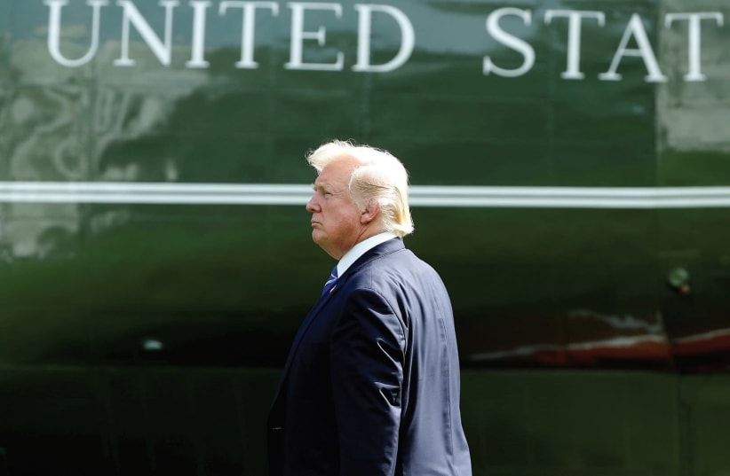 THE AUTHOR urges us not to applaud. US President Donald Trump walks to Marine One. (photo credit: REUTERS)