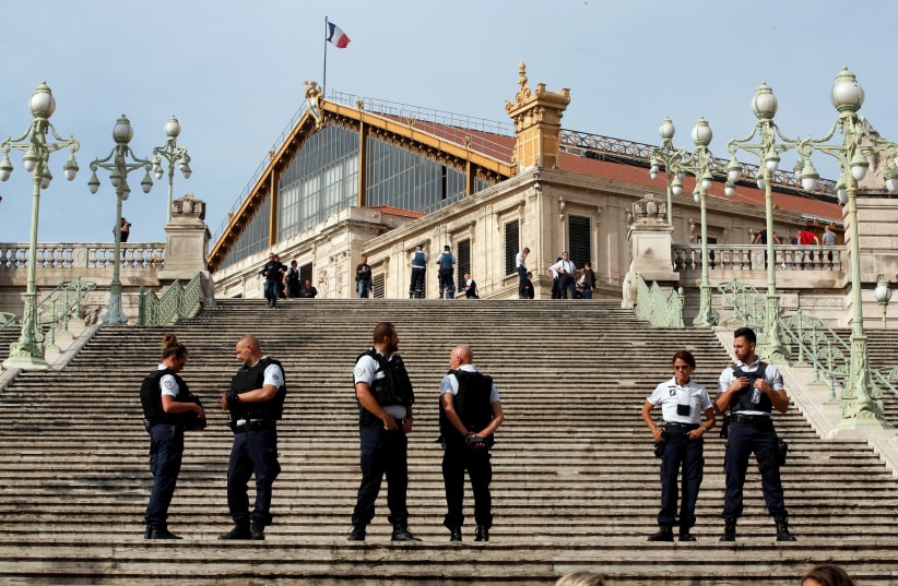 French police outside the Saint Charles train station in Marseille after a stabbing attack there that killed two people, October 2017 (photo credit: REUTERS/JEAN-PAUL PELISSIER)