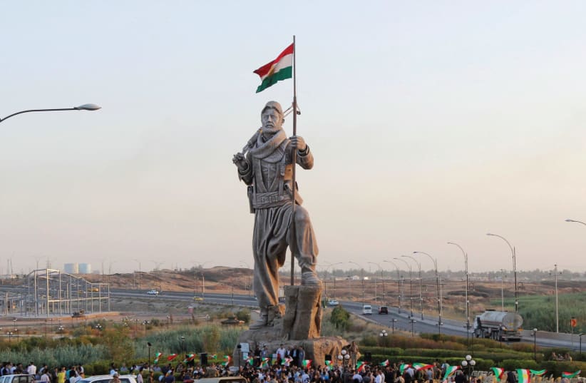 A STATUE of a Peshmerga fighter in Kirkuk. Kurds voted, now the question shifts to what their neighbors will do. (photo credit: REUTERS)