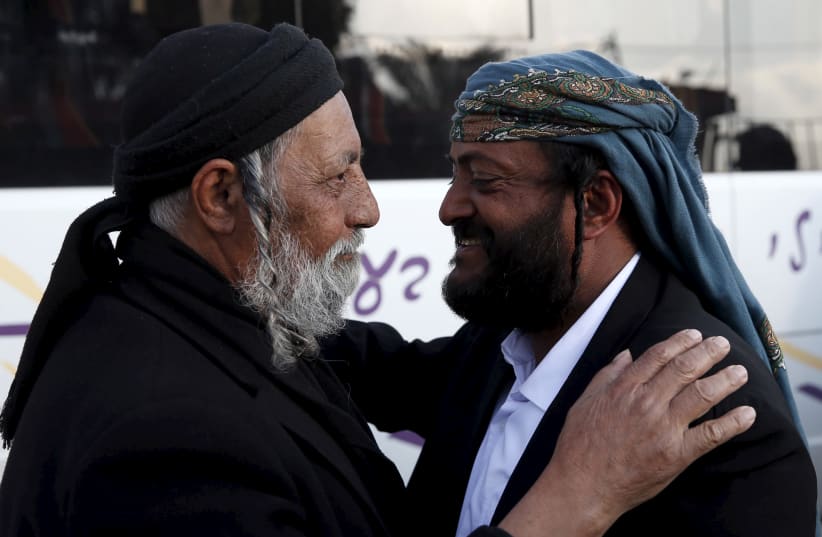 Salman Ichia (R), one of 19 Jews from Yemen, who were brought to Israel in what immigration officials described as the last covert operation to move members of a dwindling Jewish community dating back two millennia. (photo credit: REUTERS)