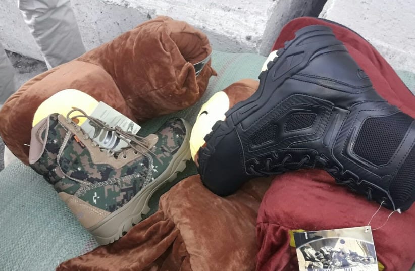  Military-grade shoes labeled as slippers destined for Hamas’s military wing in Gaza (photo credit: COGAT SPOKESMAN)