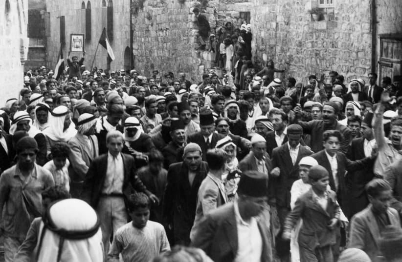 Palestinians demonstrate in the Old City of Jerusalem, 1937 (photo credit: AGENCE FRANCE PRESSE)