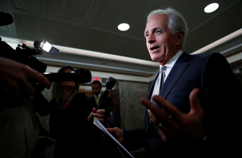 Sen. Bob Corker (R-TN) speaks with reporters after announcing his retirement. (photo credit: REUTERS)