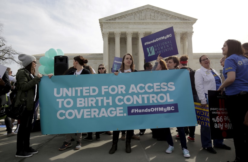 Supporters of contraception rally in Washington DC.  (photo credit: REUTERS)