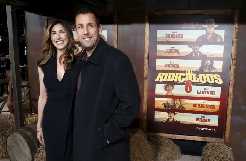 Adam Sandler and his wife Jackie (photo credit: MARIO ANZUONI/REUTERS)