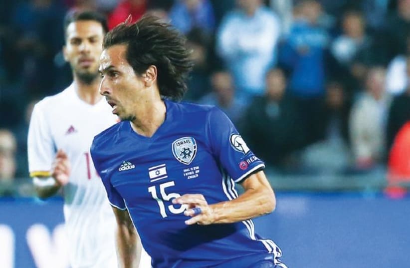 Yossi Benayoun made what was likely his final appearance for the Israel national team in Monday’s 1-0 defeat to Spain, but his expected retirement is only one of many contributing factors to the blueand- white’s uncertain future. (photo credit: DANNY MARON)