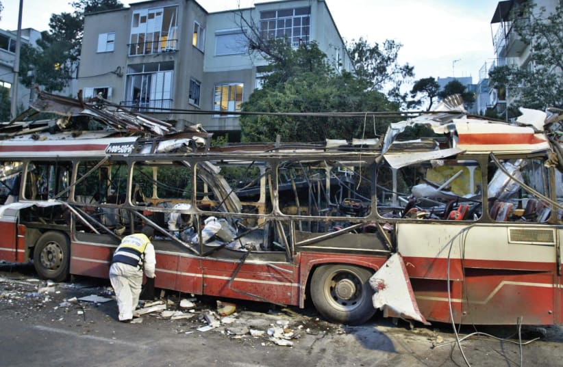 The aftermath of a bus attack in Haifa, 2003 (photo credit: REUTERS)