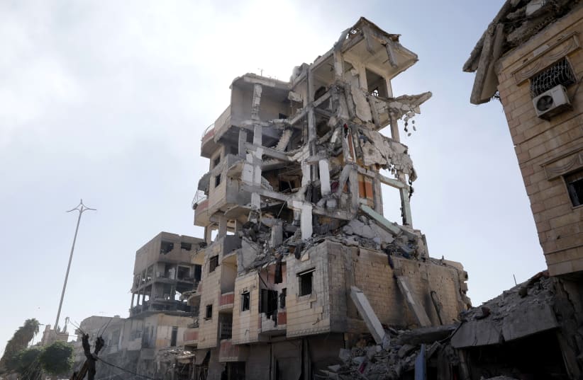 Houses destroyed in Raqqa. (photo credit: REUTERS)