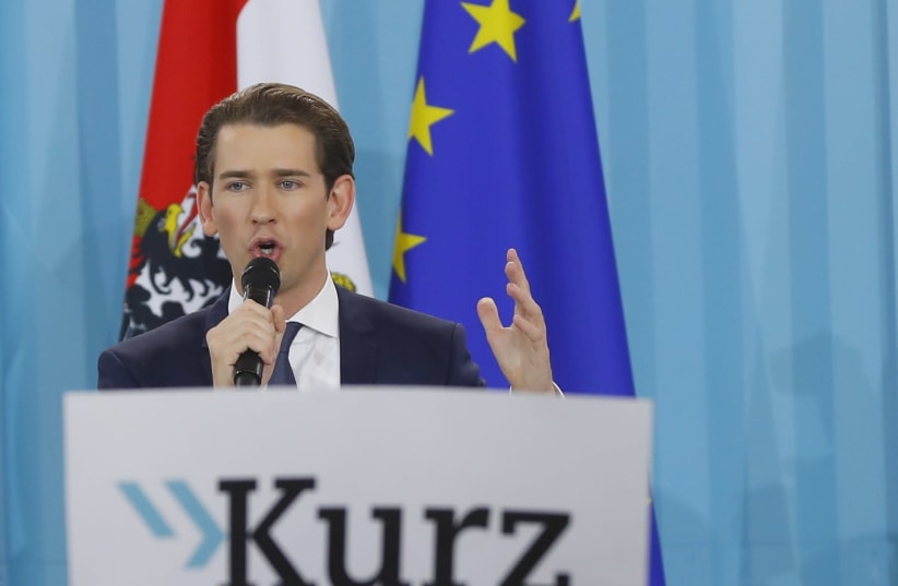 Top candidate of the People's Party (OeVP) Sebastian Kurz attends his party's victory celebration meeting in Vienna, Austria, October 15, 2017.  (photo credit: LEONHARD FOEGER / REUTERS)