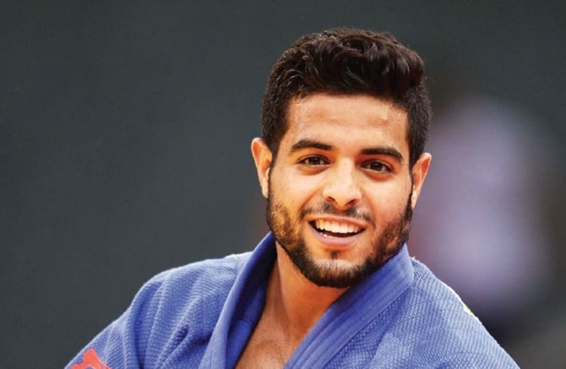 Israel's Sagi Muki is one of 12 blue-and-white judokas who are set to compete at the Abu Dhabi Grand Slam next weekend without their country’s flag by their names or on their backs due to the demand of the organizers. (photo credit: ASAF KLIGER)
