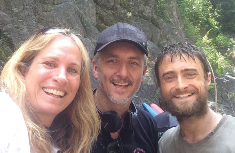 'Jungle' producer Dana Lustig (left) is seen here with director Greg McLean and actor Daniel Radcliffe on the set of the movie. (photo credit: Courtesy)