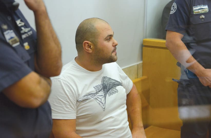 Alledged Israeli mobster Michael Mor is seen in the Nazareth Magistrate’s Court last month. (photo credit: BASEL AWIDAT/FLASH90)
