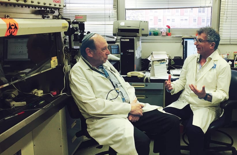 Prof. Reuven Or, from the Bone Marrow Transplantation and Cancer Immunotherapy Research Center, speaks with Pluristem CEO Zami Aberman last month. (photo credit: PLURISTEM)