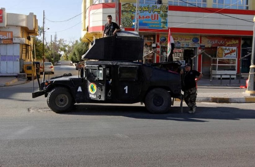 A vehicle of the Iraqi Federal police is seen on a street in Kirkuk, Iraq October 19, 2017. Picture taken October 19, 2017. (photo credit: REUTERS/AKO RASHEED)