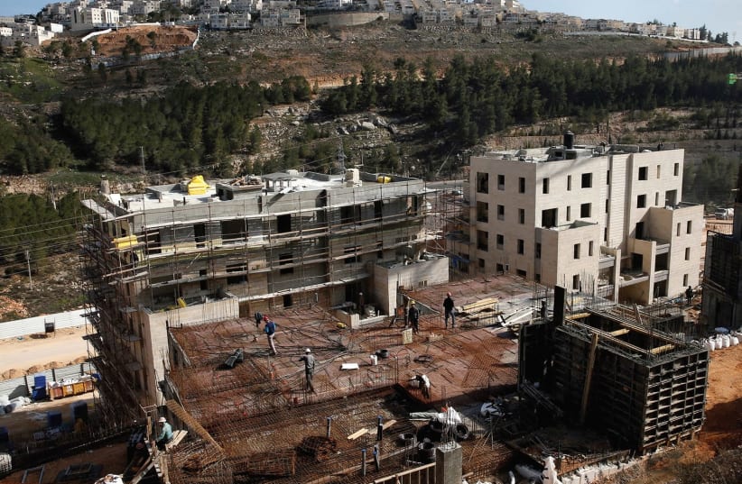 A VIEW of the Jerusalem neighborhoods of Ramot (foreground) and Ramat Shlomo (background). (photo credit: REUTERS)