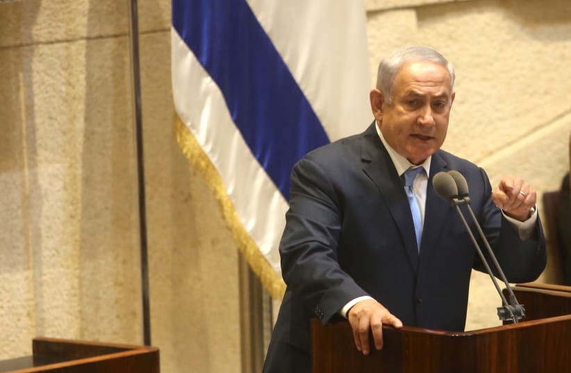 Prime Minister Netanyahu addresses Knesset, October 2017 (photo credit: MARC ISRAEL SELLEM/THE JERUSALEM POST)