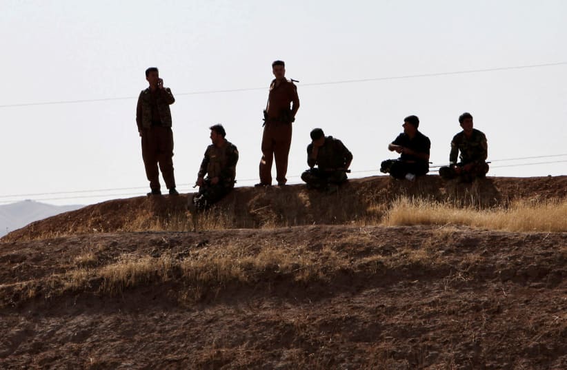 Kurdish Peshmarga forces are seen near Altun Kupri, between Kirkuk and Erbil (photo credit: AZAD LASHKARI / REUTERS)