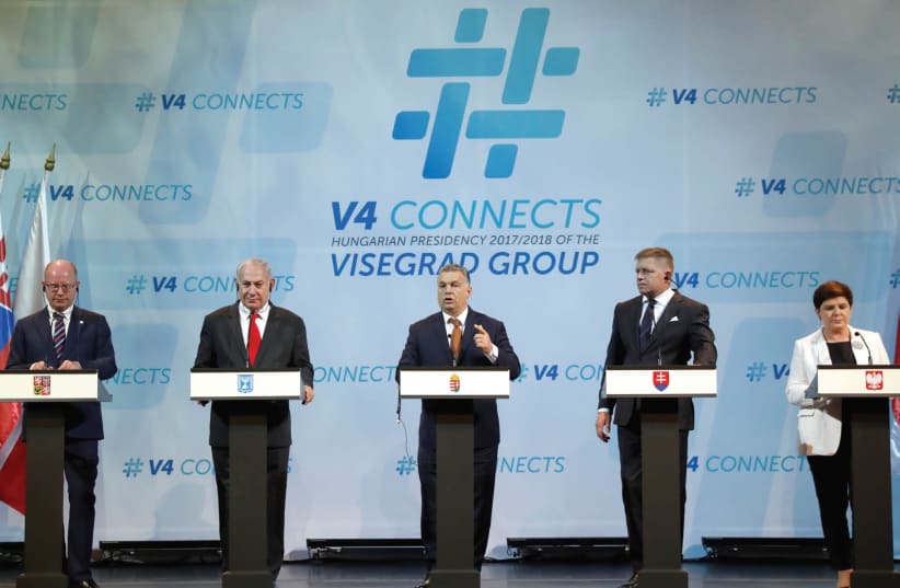 Prime Minister Benjamin Netanyahu, Visegrad Group (V4) Prime Ministers, Czech Republic’s Bohuslav Sobotka (L), Hungary’s Viktor Orban (C to R), Slovakia’s Robert Fico and Poland’s Beata Szydlo attend a news conference in Budapest, Hungary in July. (photo credit: REUTERS)